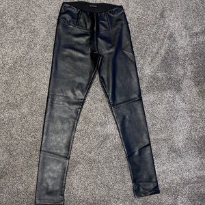 Size M Vegan Leather Stretchy Black Leggings. No holes or damage. Like New Cond